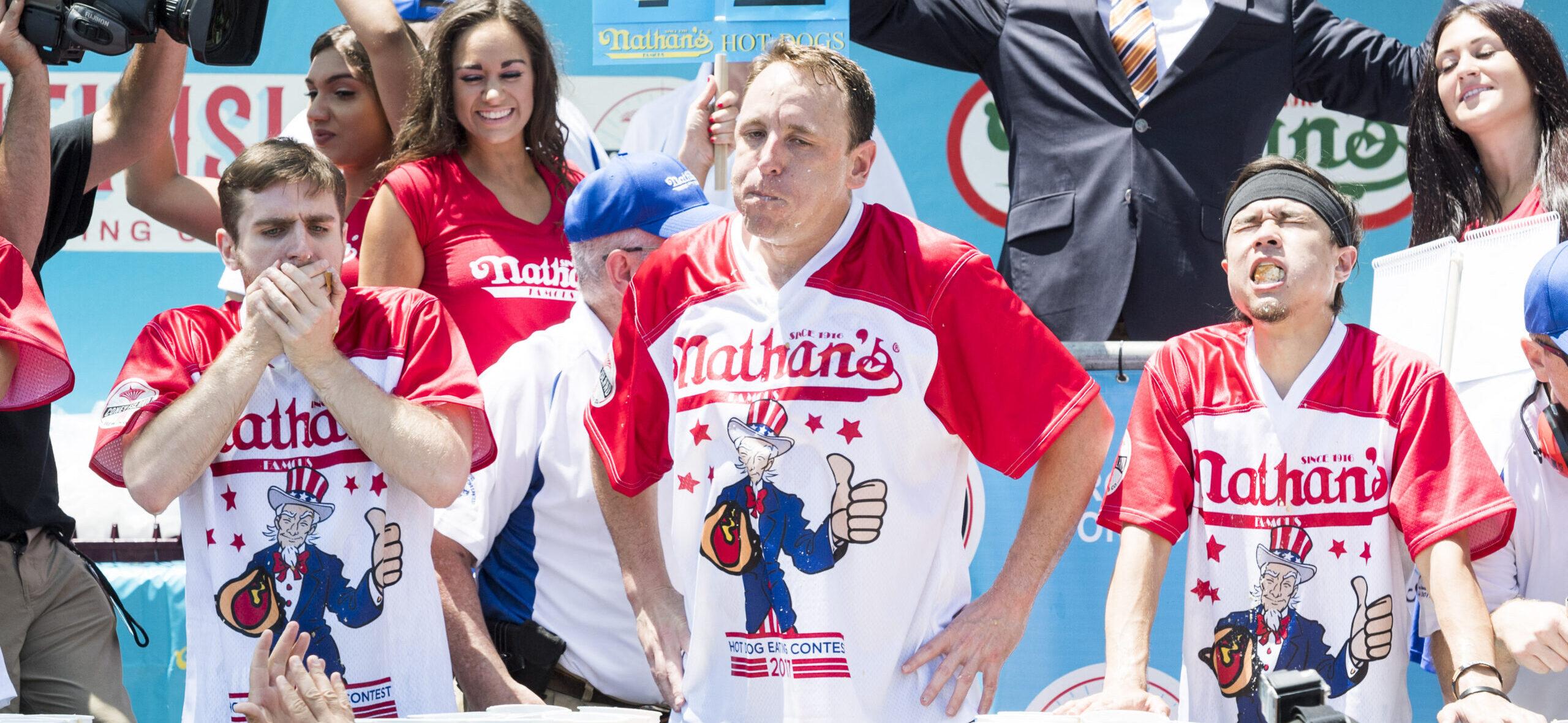 Joey Chestnut and others compete in Nathans Famous International Hot Dog Eating Contest