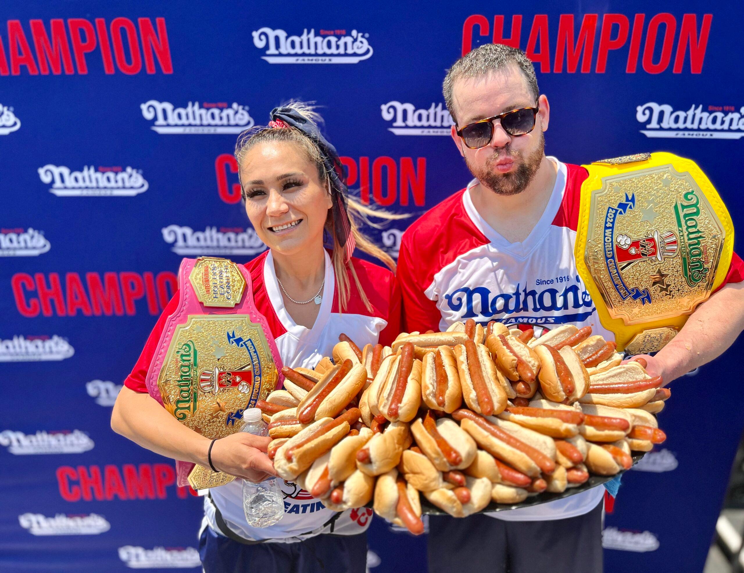 Patrick Bertoletti and Miki Sudo celebrating their win at the 2024 Nathan hotdog eating contest