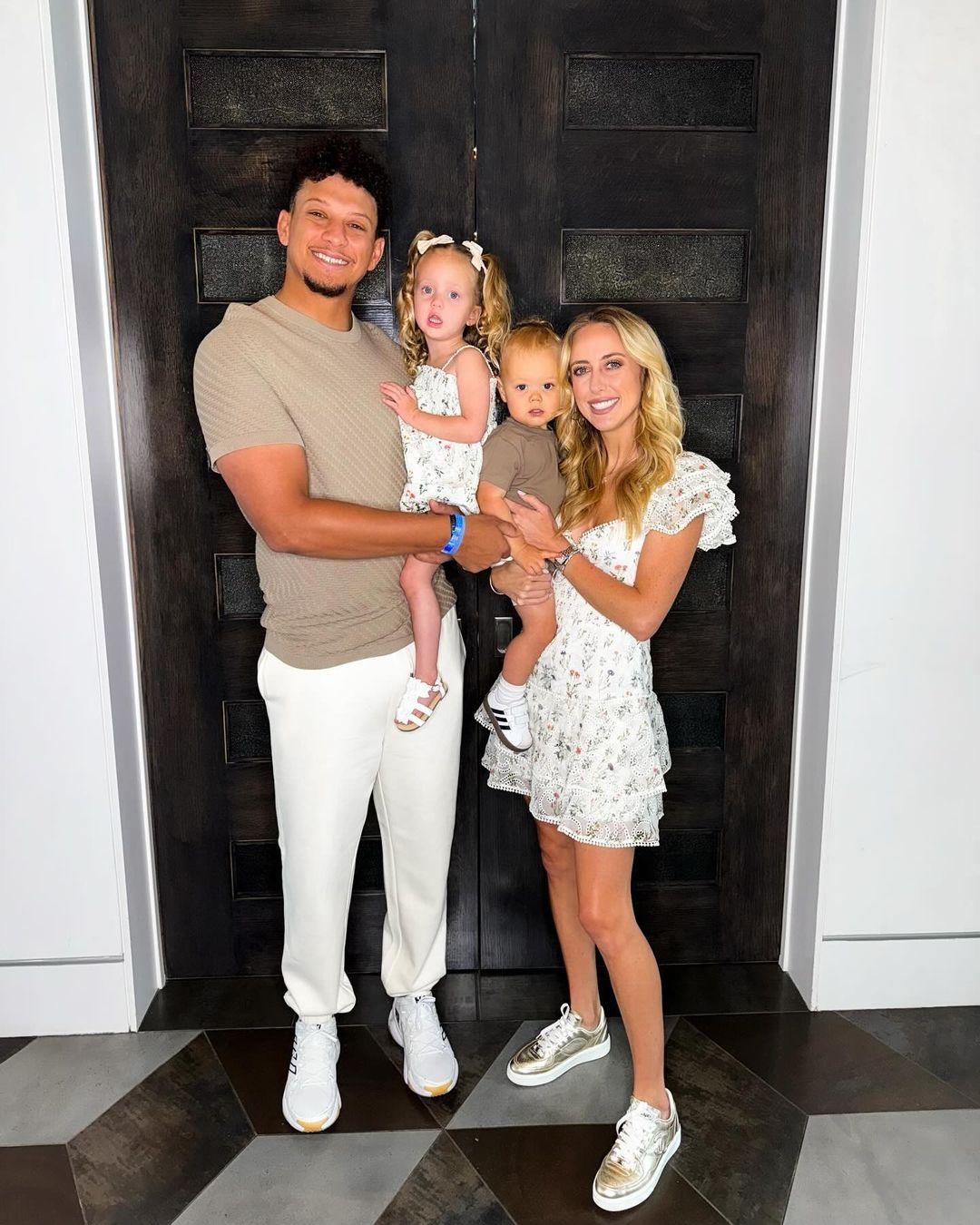Brittany Mahomes and Patrick Mahomes with their two children