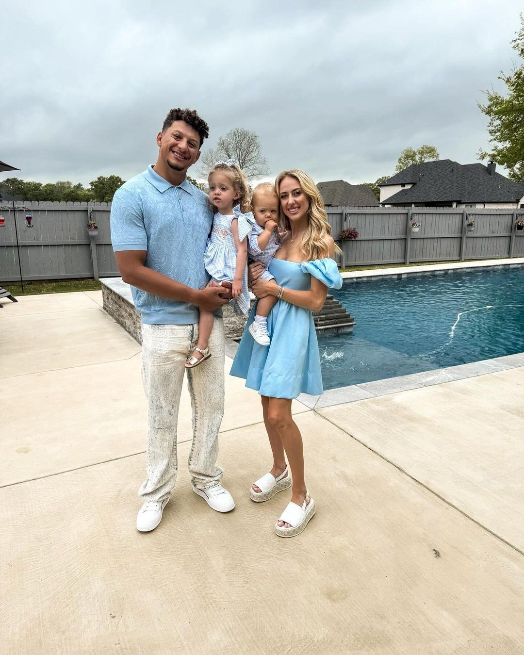 Brittany Mahomes and Patrick Mahomes with their two children