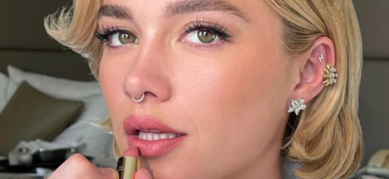 Florence Pugh has lipstick applied