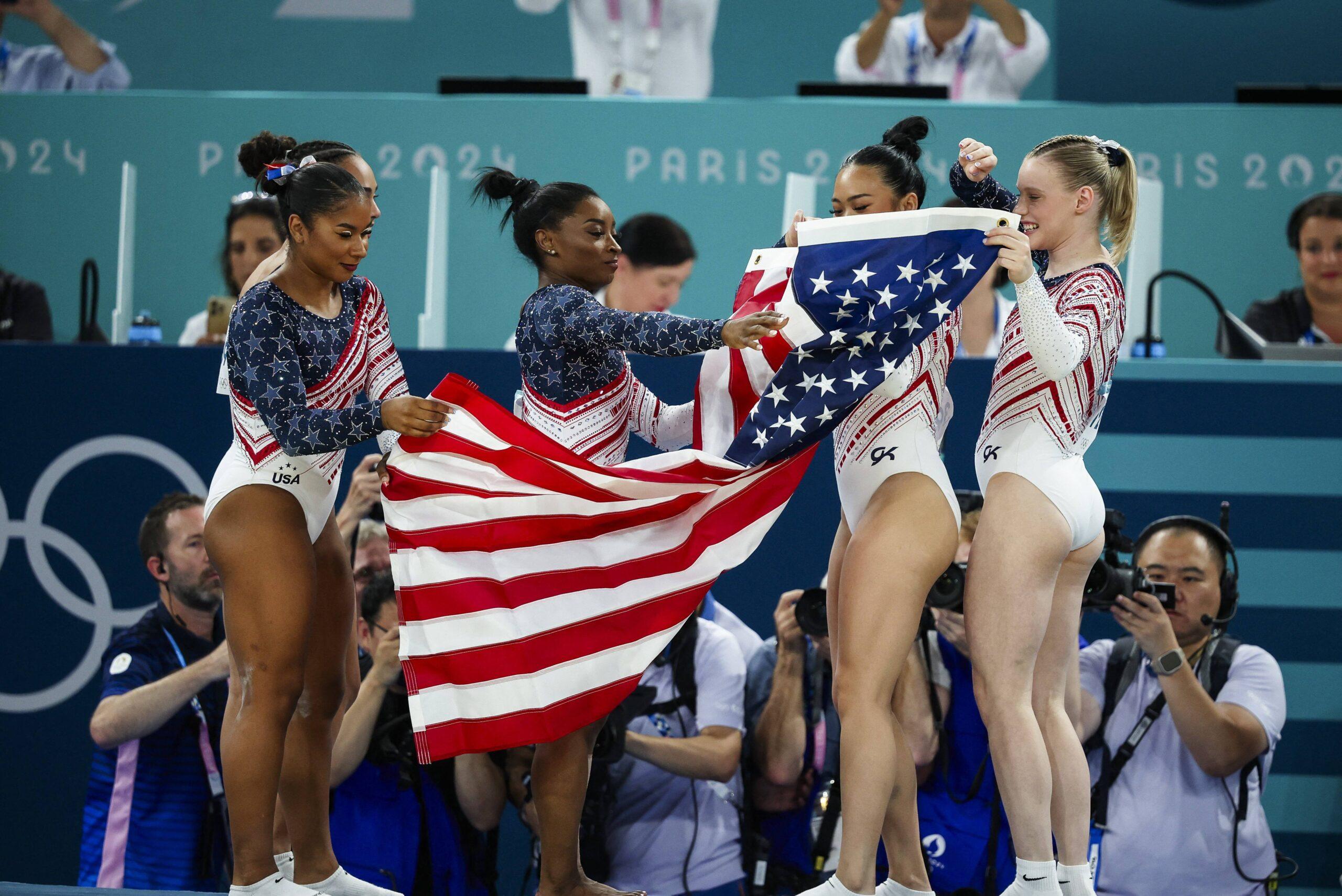 Simone Biles, Jordan Chiles, Hezley Rivera, Jade Carey, and Suni Lee after winning Team Gold