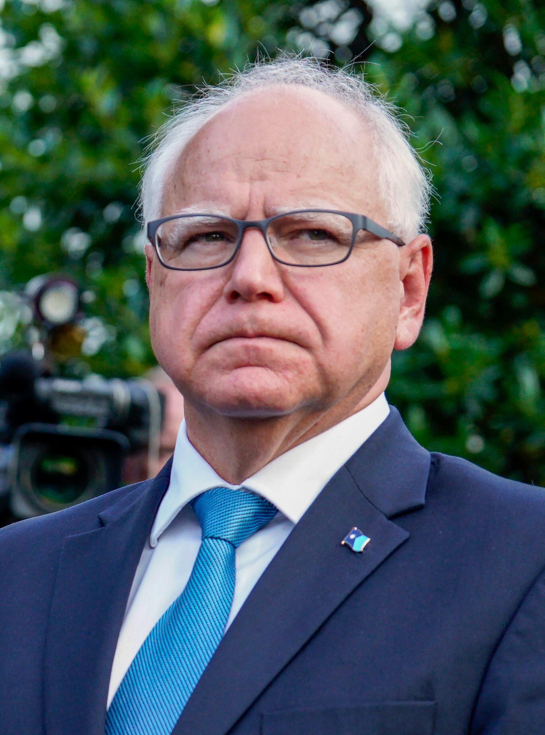 Governor Tim Walz speak to members of the media after their meeting with US President Joe Biden at the White House in Washington on July 3, 2024.