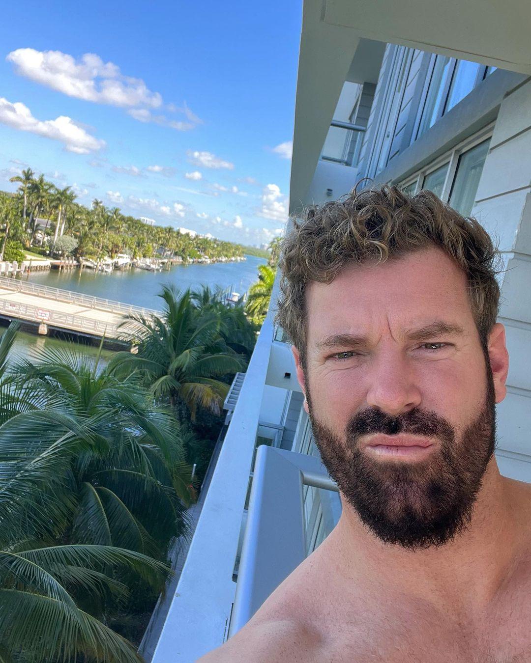 James McCoy Taylor takes a selfie on a balcony