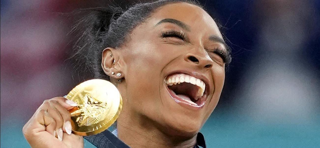 Simone Biles of the United States poses after winning gold in the women's artistic gymnastics individual vault final at the Paris Olympics on Aug. 3, 2024