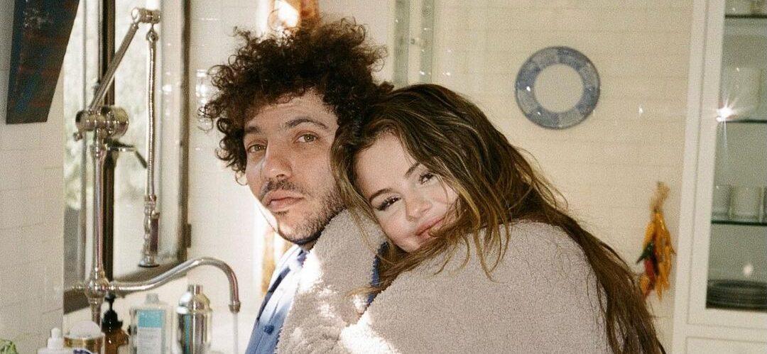 Benny Blanco and Selena Gomez hugging in the kitchen