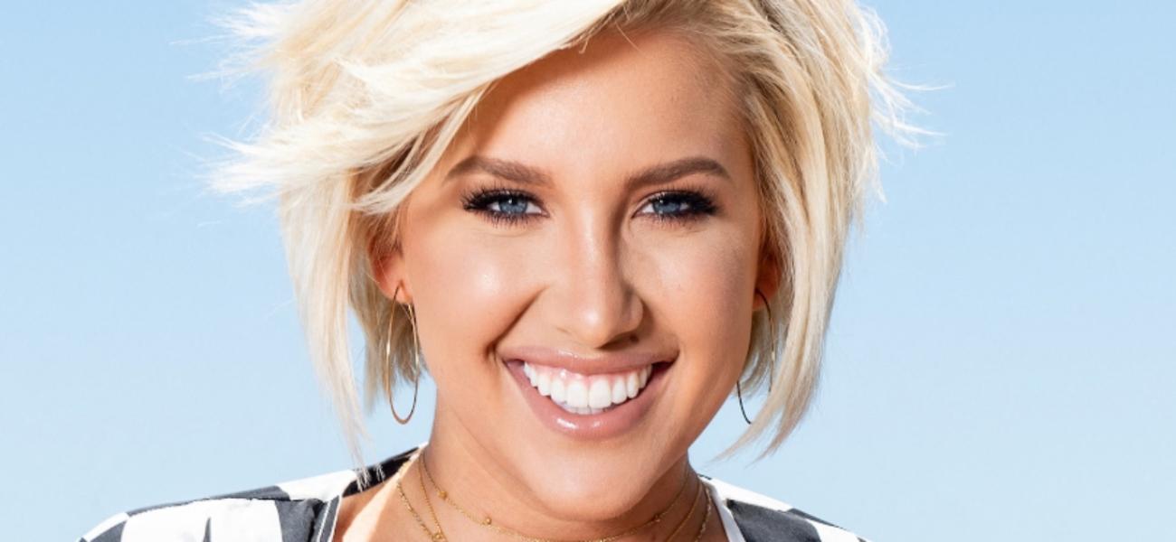 Savannah Chrisley smiling outdoors