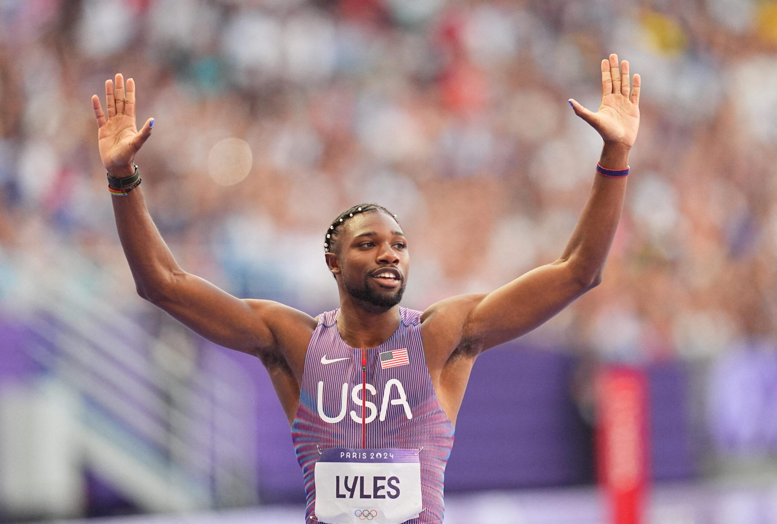 Noah Lyles celebrating at the 2024 Paris Olympics