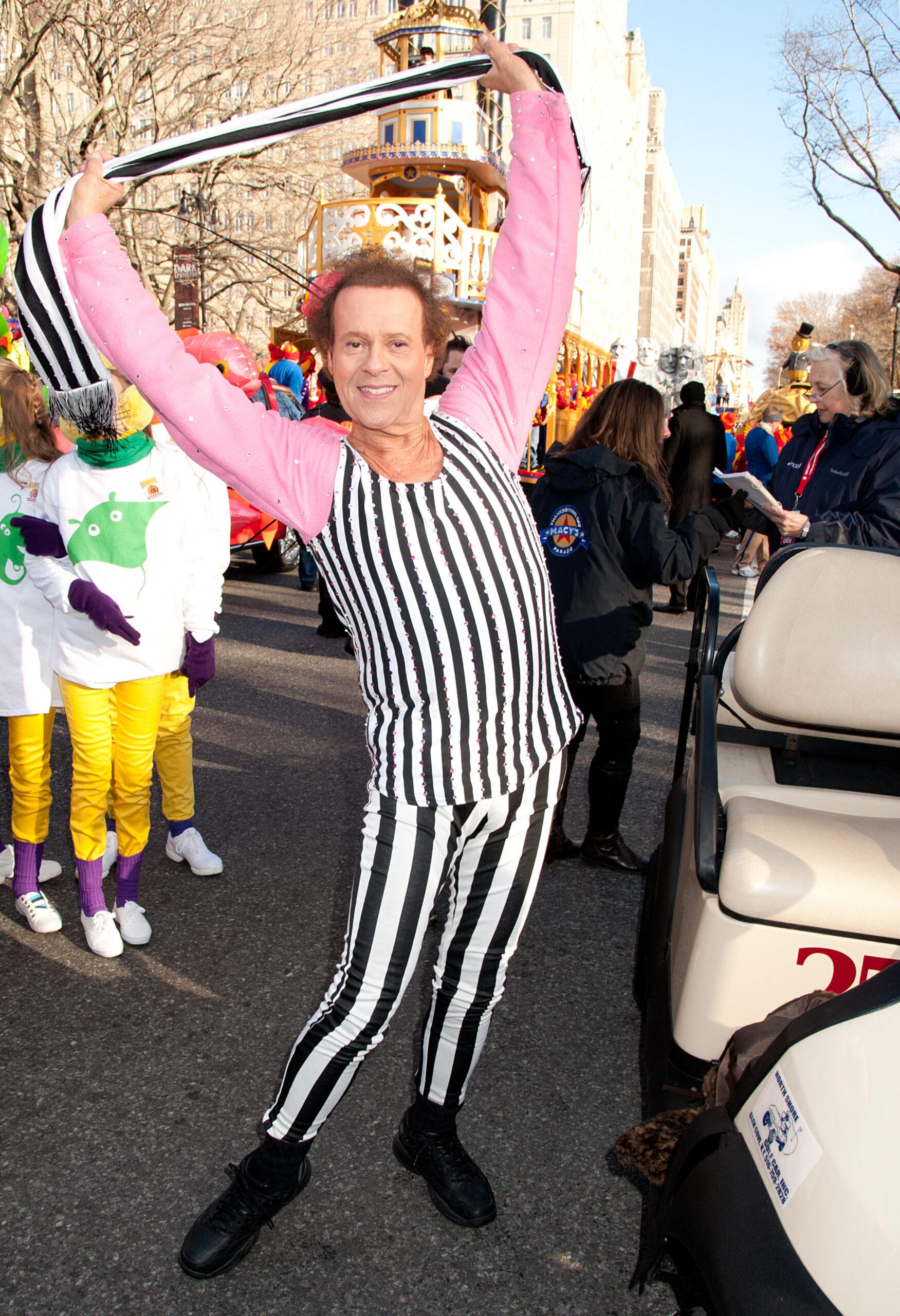 Richard Simmons wears black and white outfit