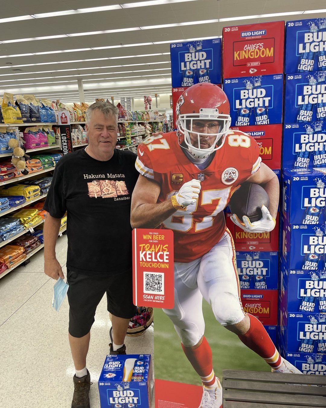 Ed Kelce posing with Patrick Mahomes cardboard cutout