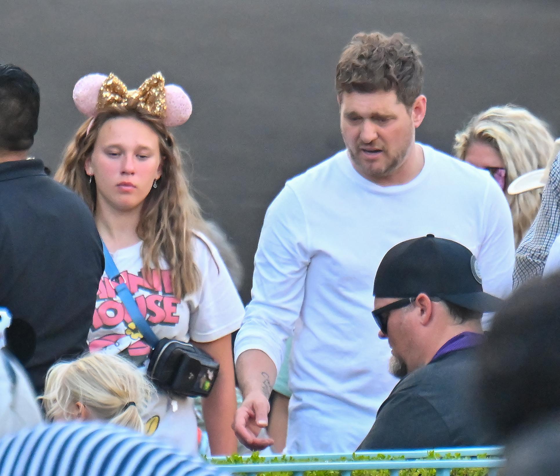 Michael Bublé has a fun day out at Disneyland with his family