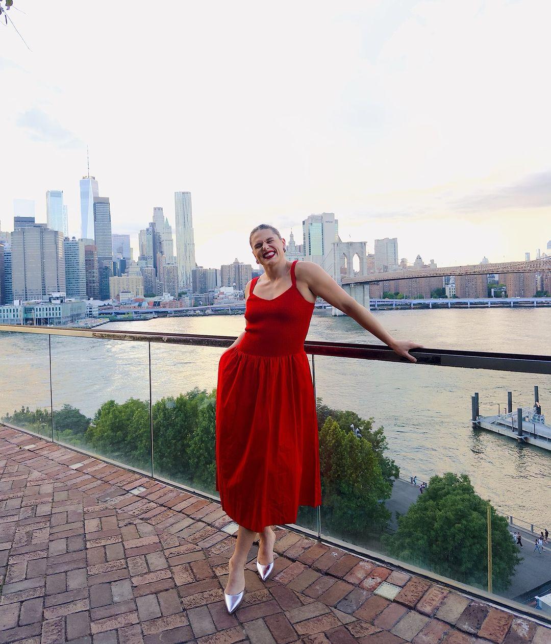 Ilona Maher in a red dress