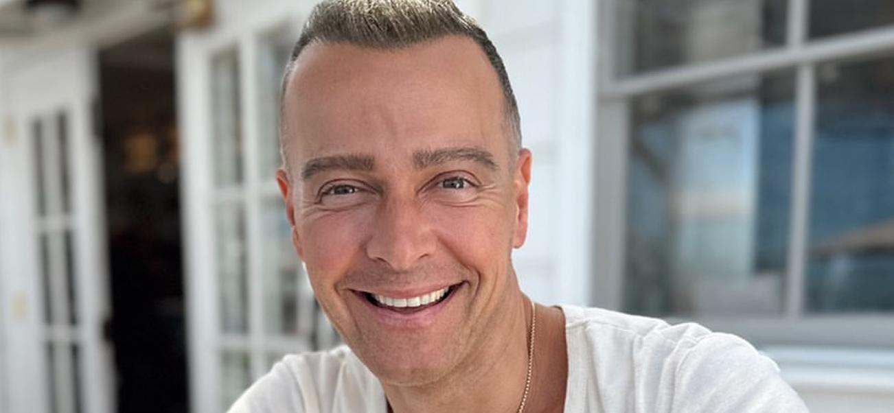 A close up photo of Joey Lawrence smiling