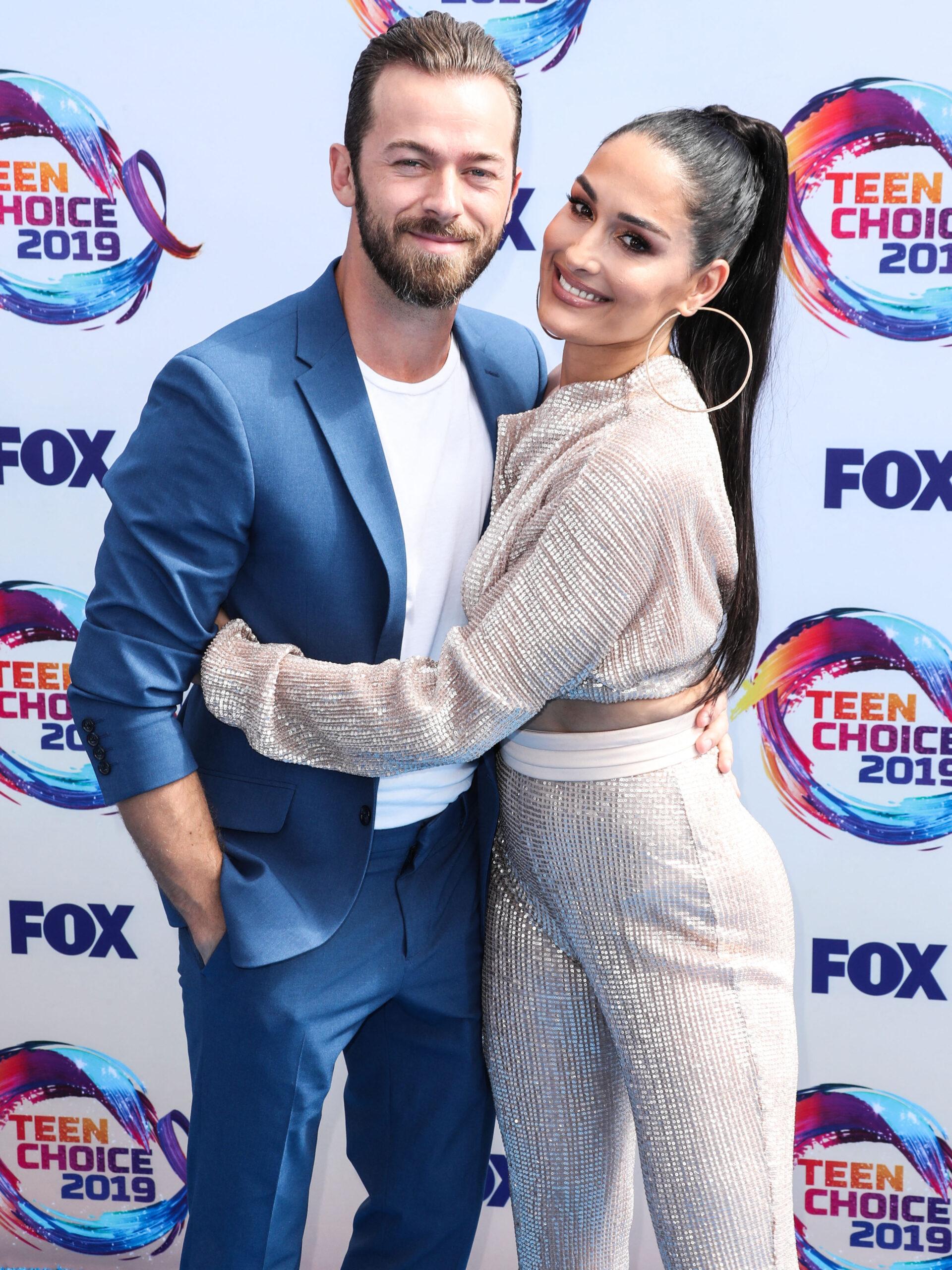 Nikki Garcia and Artem Chigvintsev at FOX's Teen Choice Awards 2019