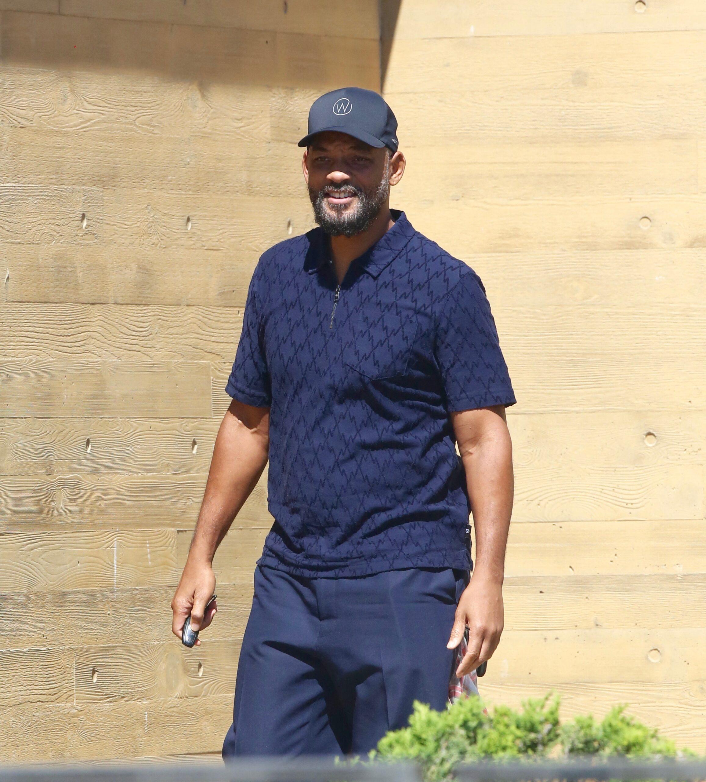 Will Smith and Jada Pinkett Smith are seen leaving Nobu restaurant