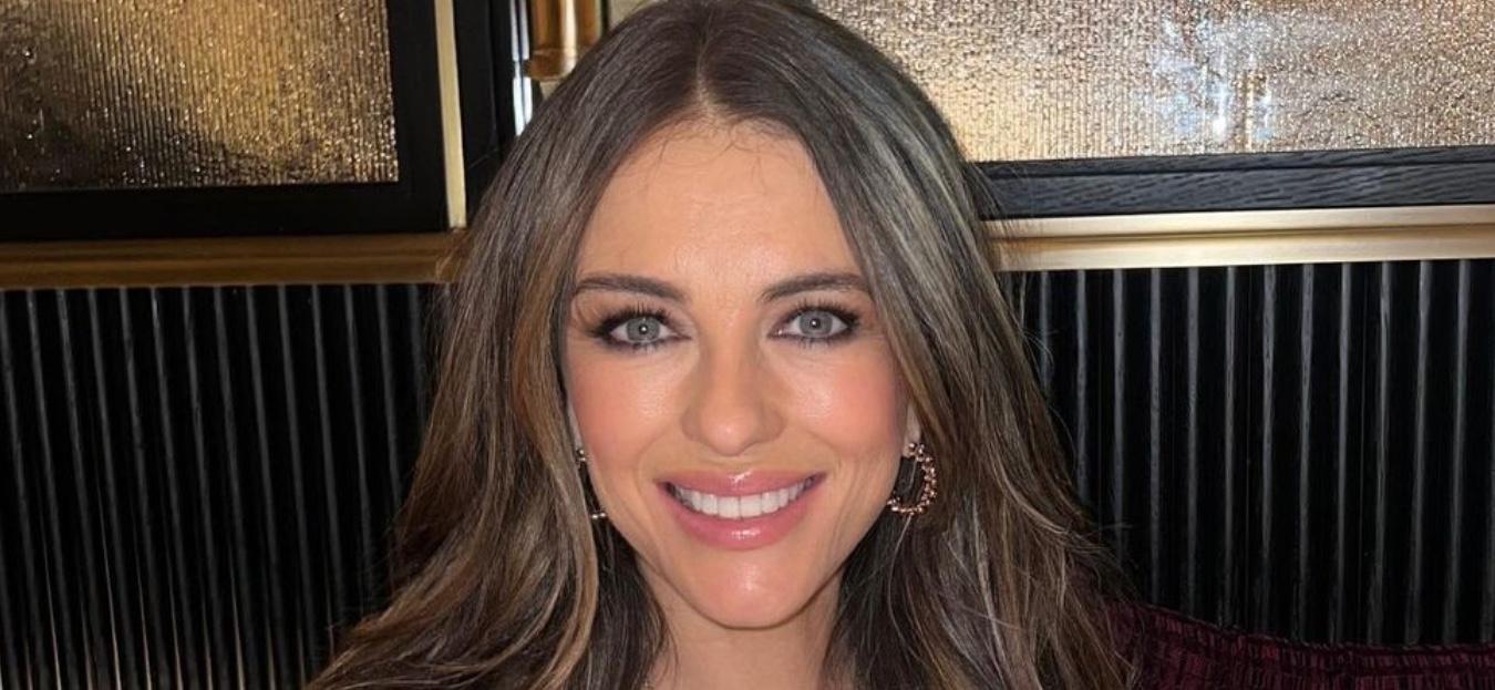 Elizabeth Hurley smiles at the camera.