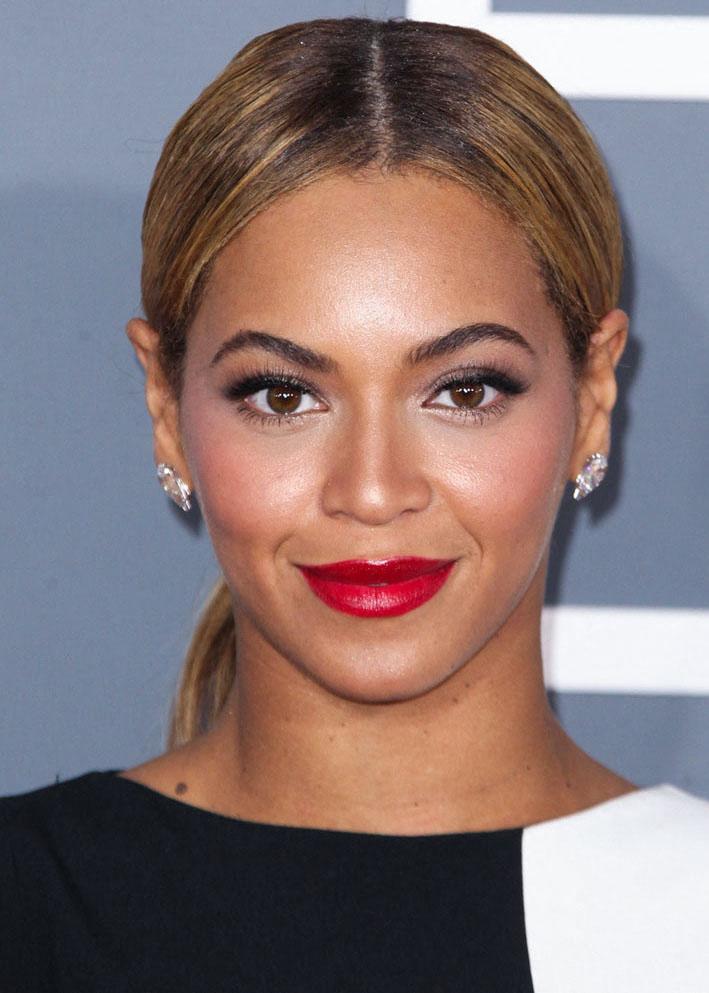 Beyonce is carrying a red lipstick