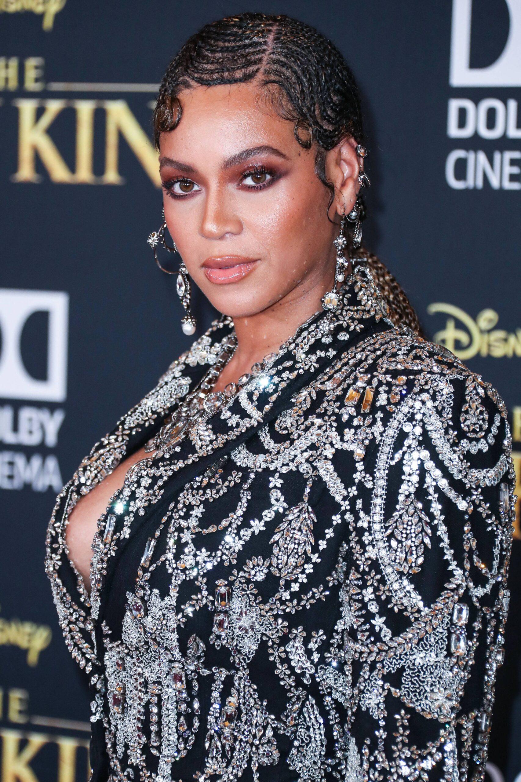 Beyonce Knowles Carter wearing an outfit by Alexander McQueen and Lorraine Schwartz jewelry arrives at the World Premiere Of Disney's 'The Lion King'