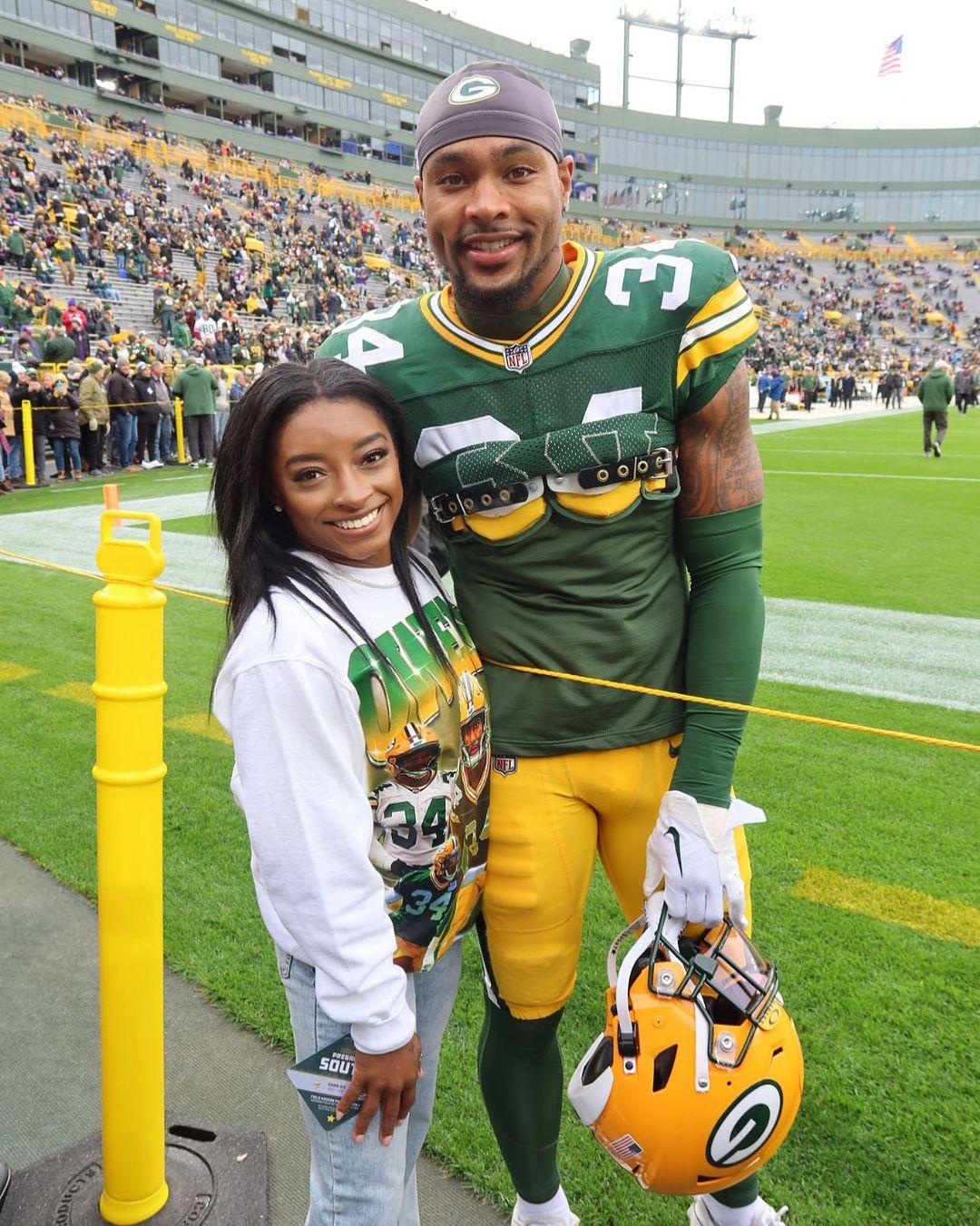 Jonathan Owens and Simone Biles on the NFL field