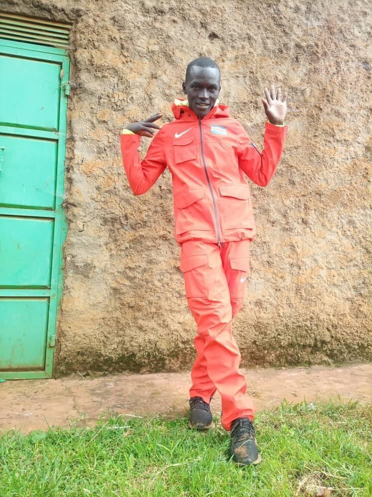 Dickson Ndiema in an orange jumpsuit