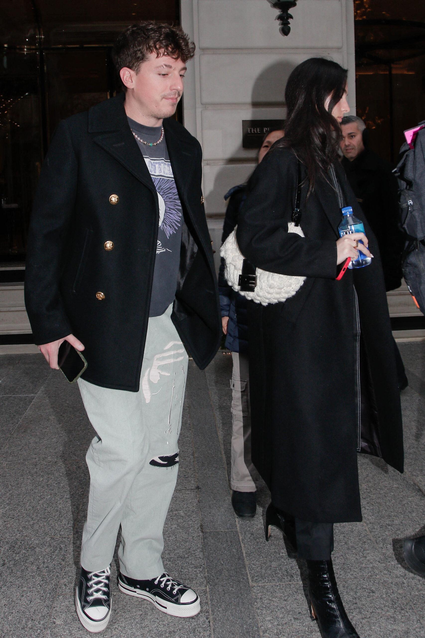 Charlie Puth and Brooke Sansone are seen leaving their hotel in Paris