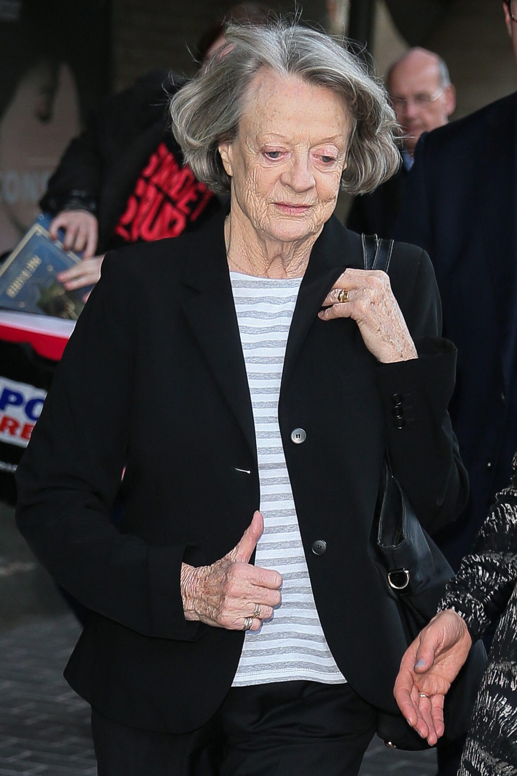 Actress Maggie Smith seen leaving the National Theatre after attending playwriter Sir Peter Shafter memorial service - London