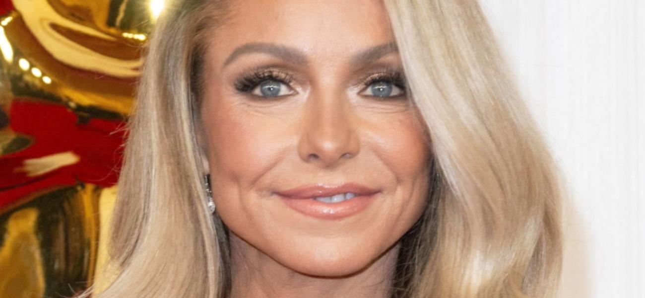 Kelly Ripa smiles at an event