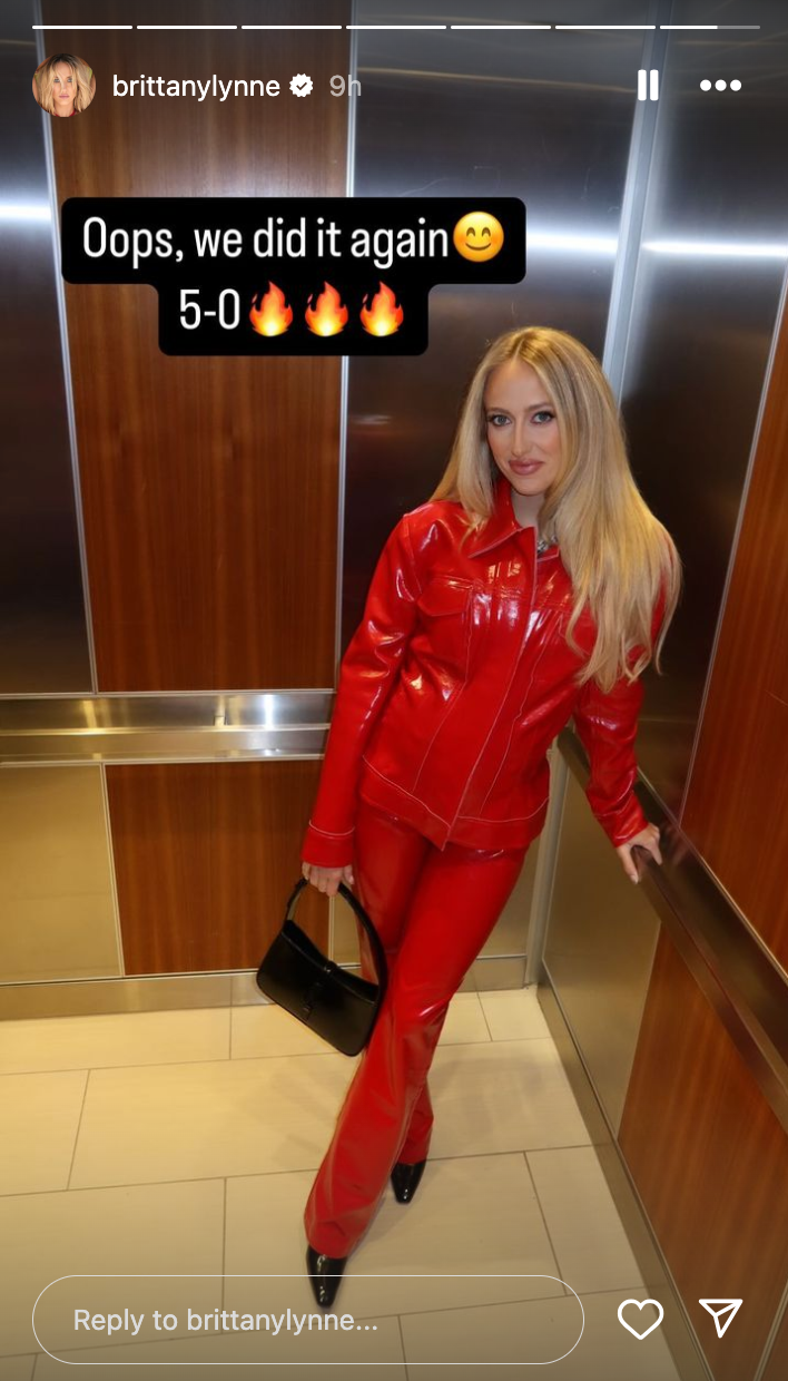 Brittany Mahomes wearing red leather outfit