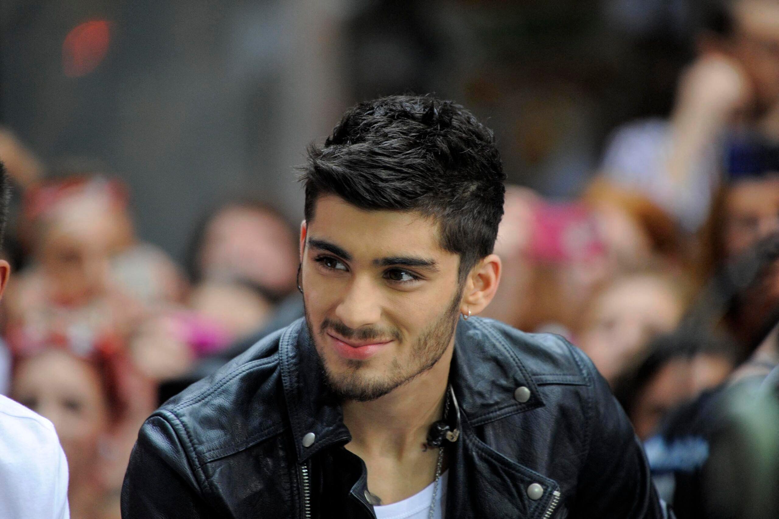 Zayn Malik wearing a leather jacket