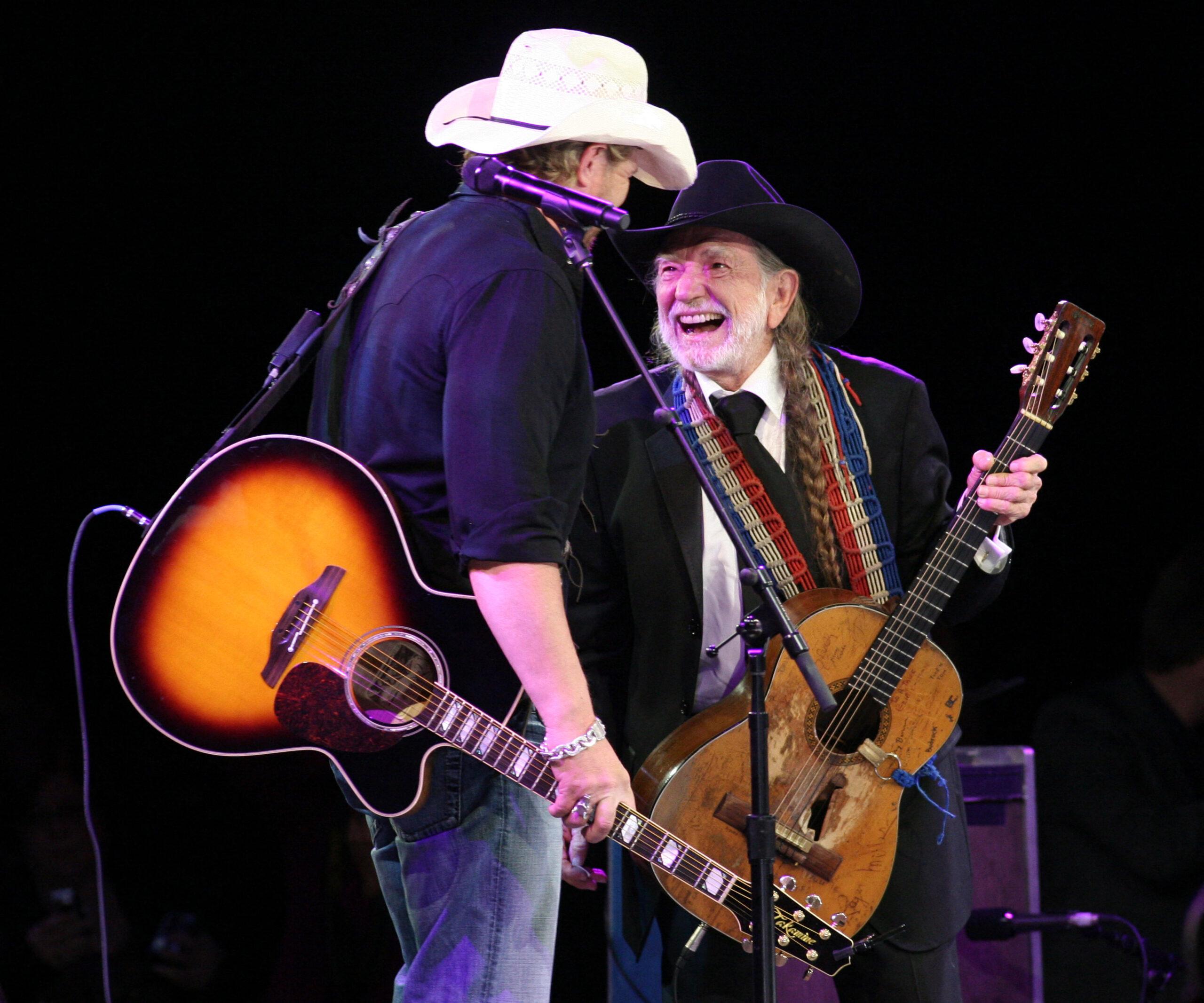 Willie Nelson and Toby Keith laughing