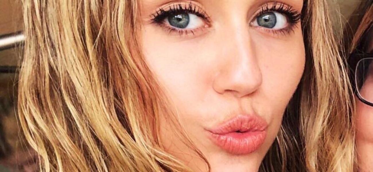 Miley Cyrus close up and pouting