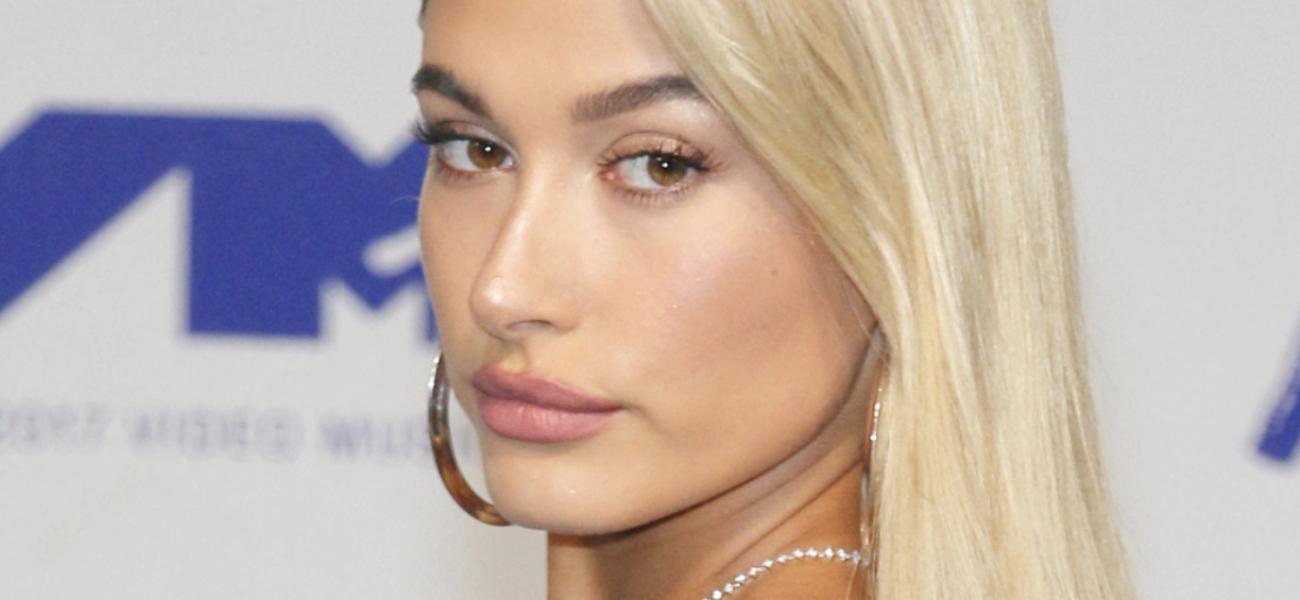 Hailey Bieber poses up close