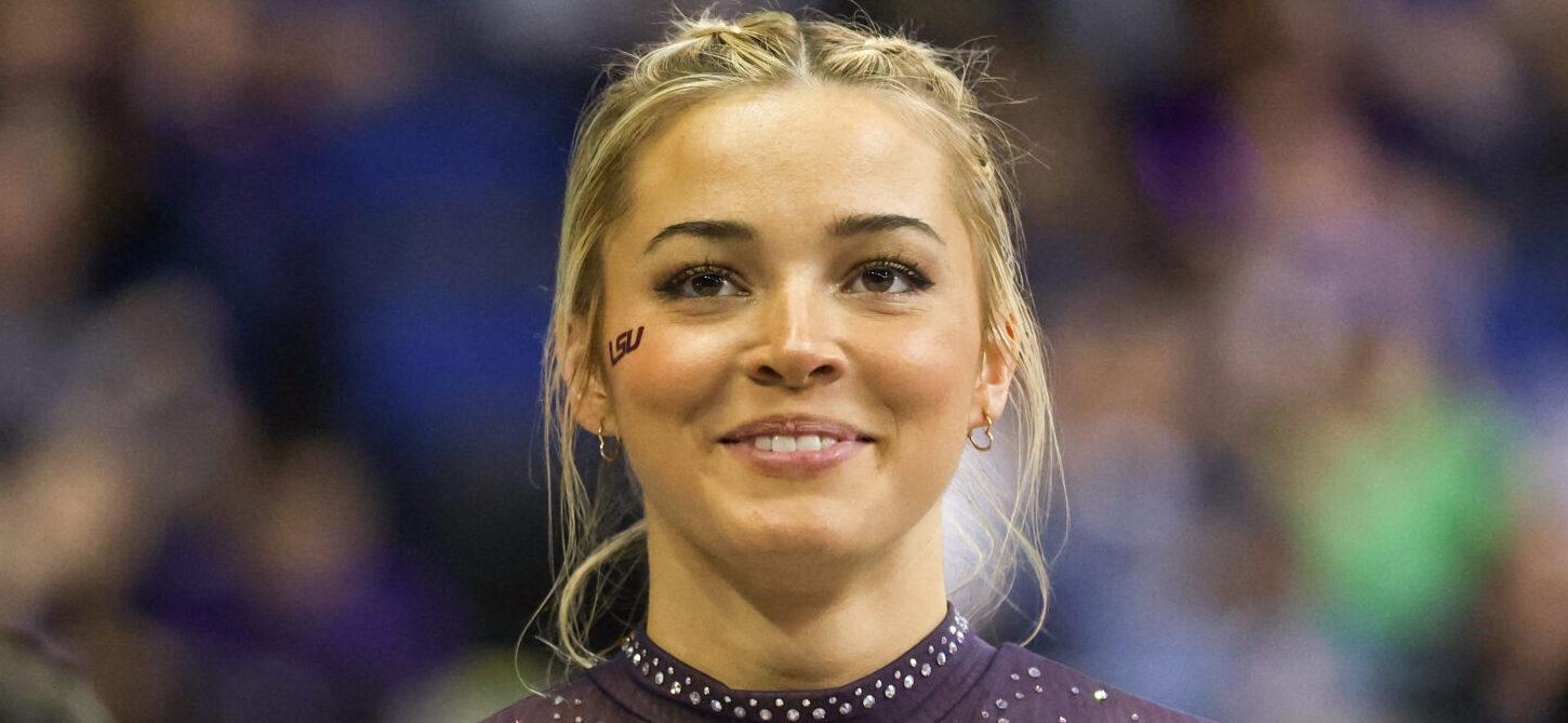 March 8, 2024: LSU's Olivia Dunne smiles to a fan during the Purple and Gold Podium Challenge woman's gymnastics quad meet at the Raising Canes River Center in Baton Rouge, LA. Jonathan Mailhes/CSM (Credit Image: © Jonathan Mailhes/Cal Sport Media) Newscom/(Mega Agency TagID: csmphotothree239106.jpg) [Photo via Mega Agency]