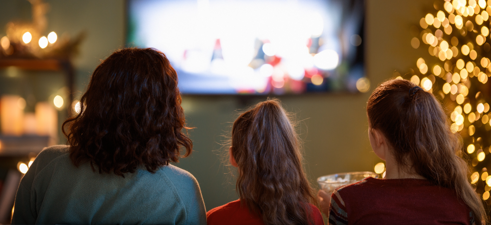 Family watching christmas movies