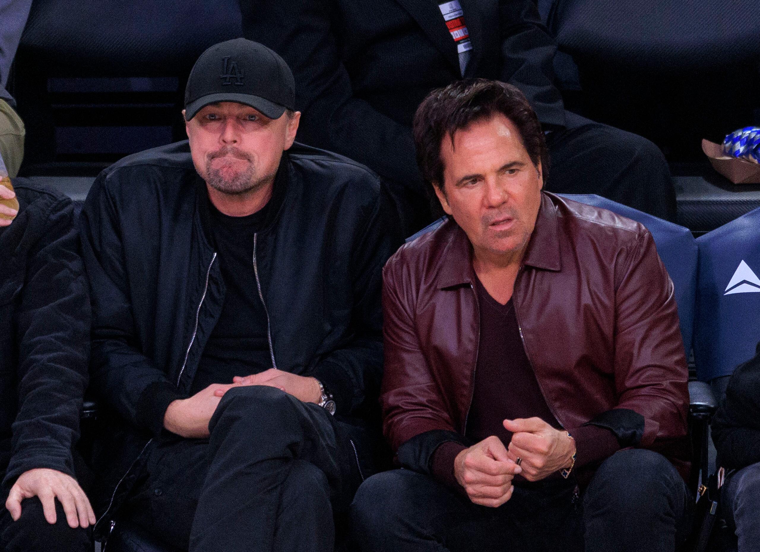 Leonardo Dicaprio and Tom Gores at NBA game