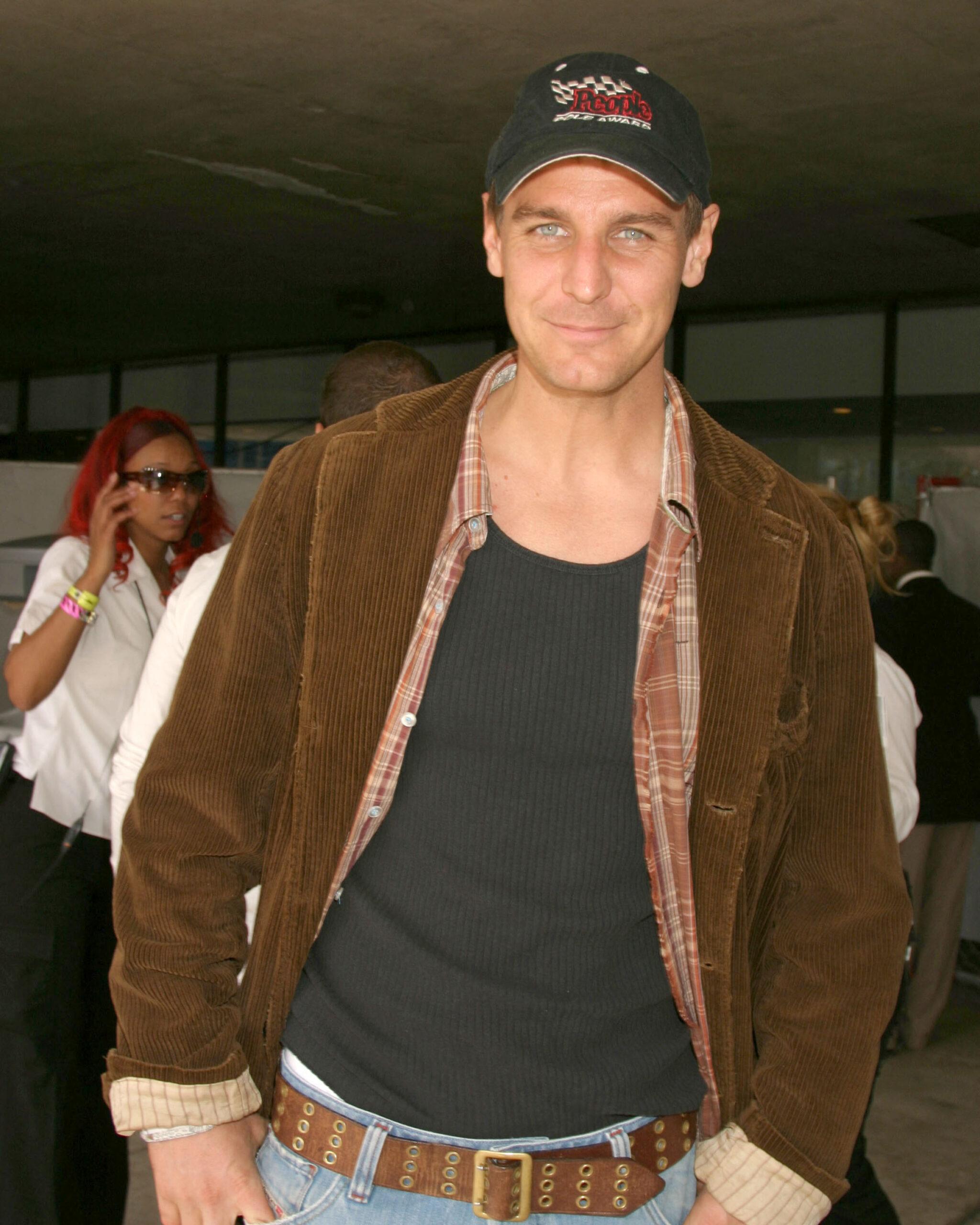 Ingo Rademacher wearing brown jacket