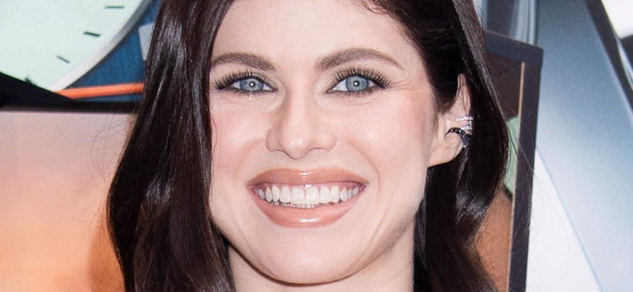 Alexandra Daddario smiles close up