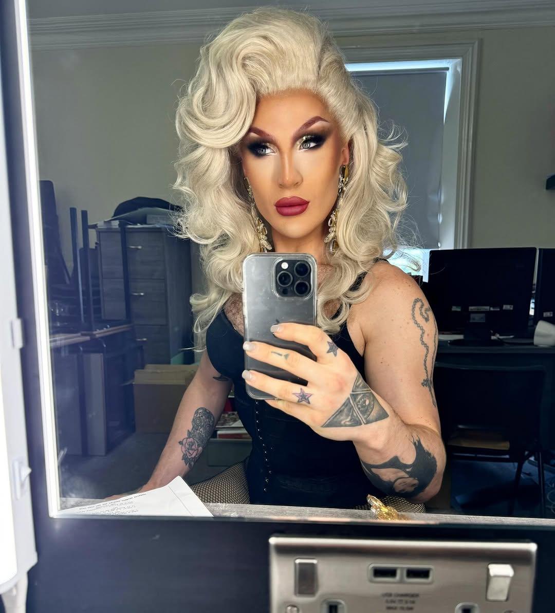 Vivienne takes a selfie with the mirror