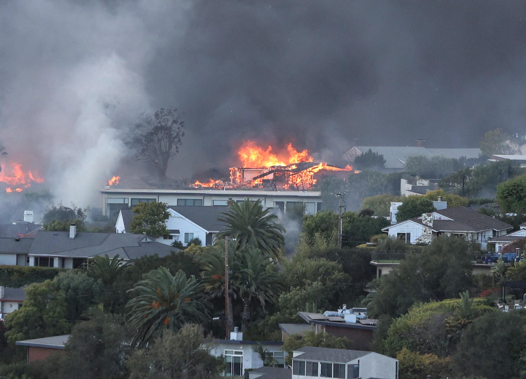 Pacific Palisades fire as it consumes residents homes and neighborhoods