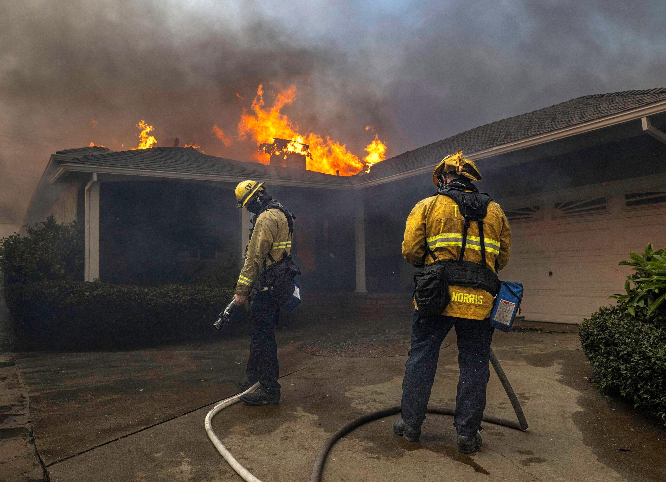 Firefighters putting out California Wildfires 2025