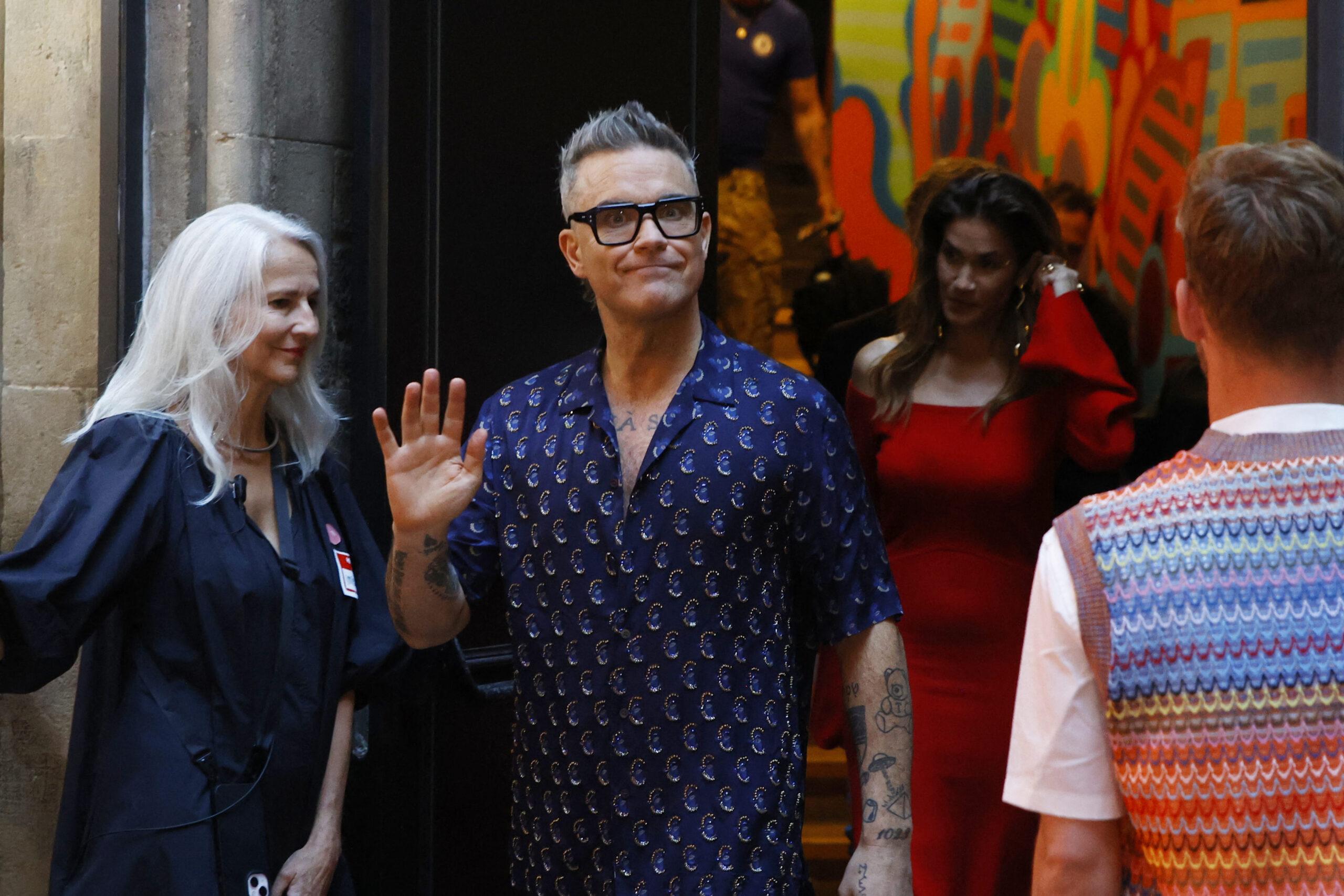 Robbie Williams exhibits his artwork on mental health in Barcelona