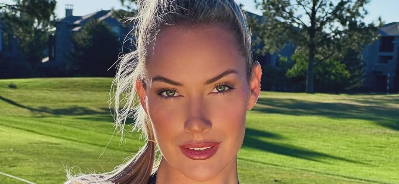 Paige Spiranac poses for the camera.