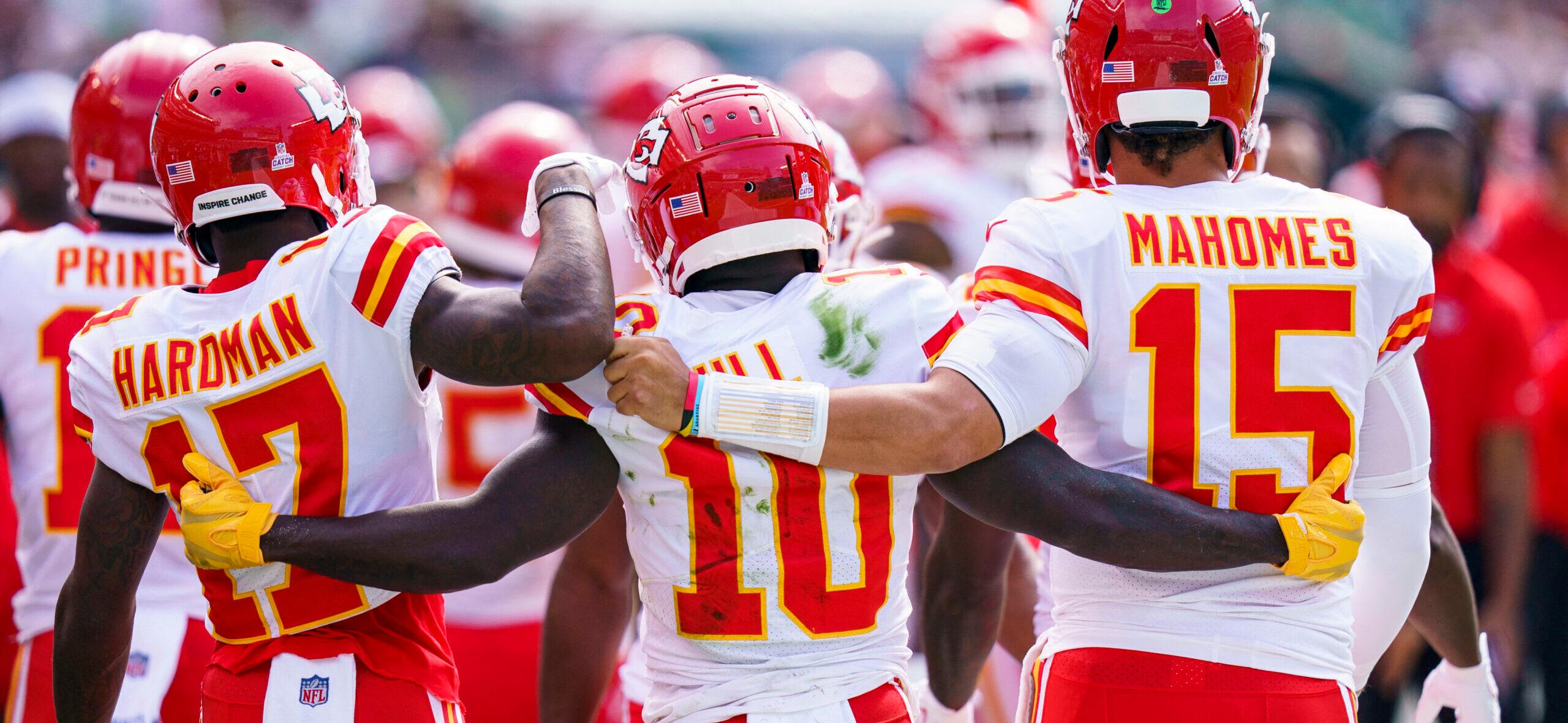 Mecole Hardman, Tyreek Hill, and Patrick Mahomes on NFL field