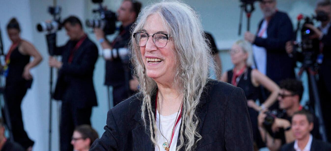 Patti Smith poses on "Maria" Red Carpet