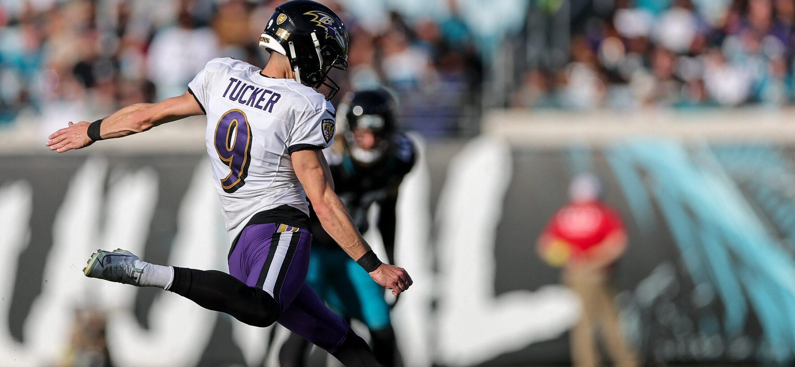 Justin Tucker kicking a football