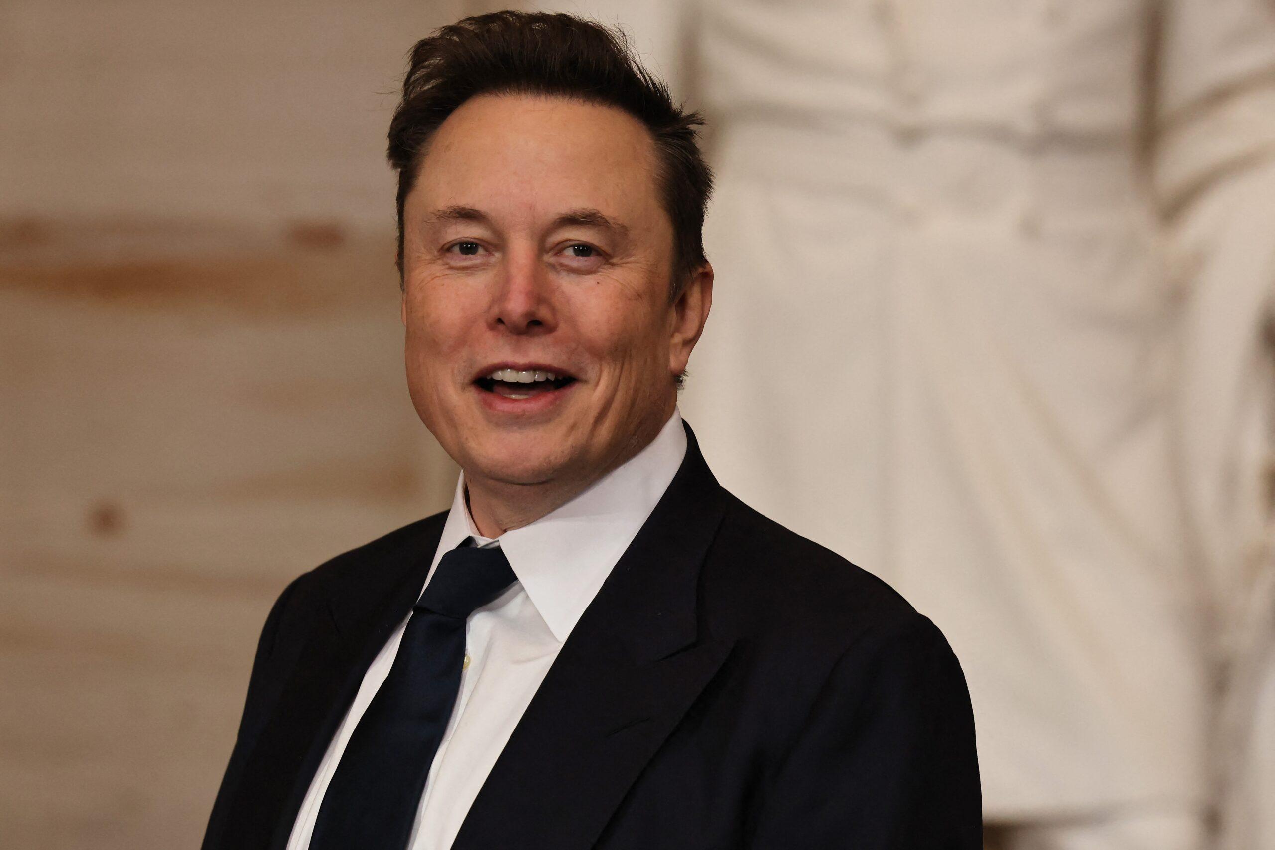 Elon Musk in a suit