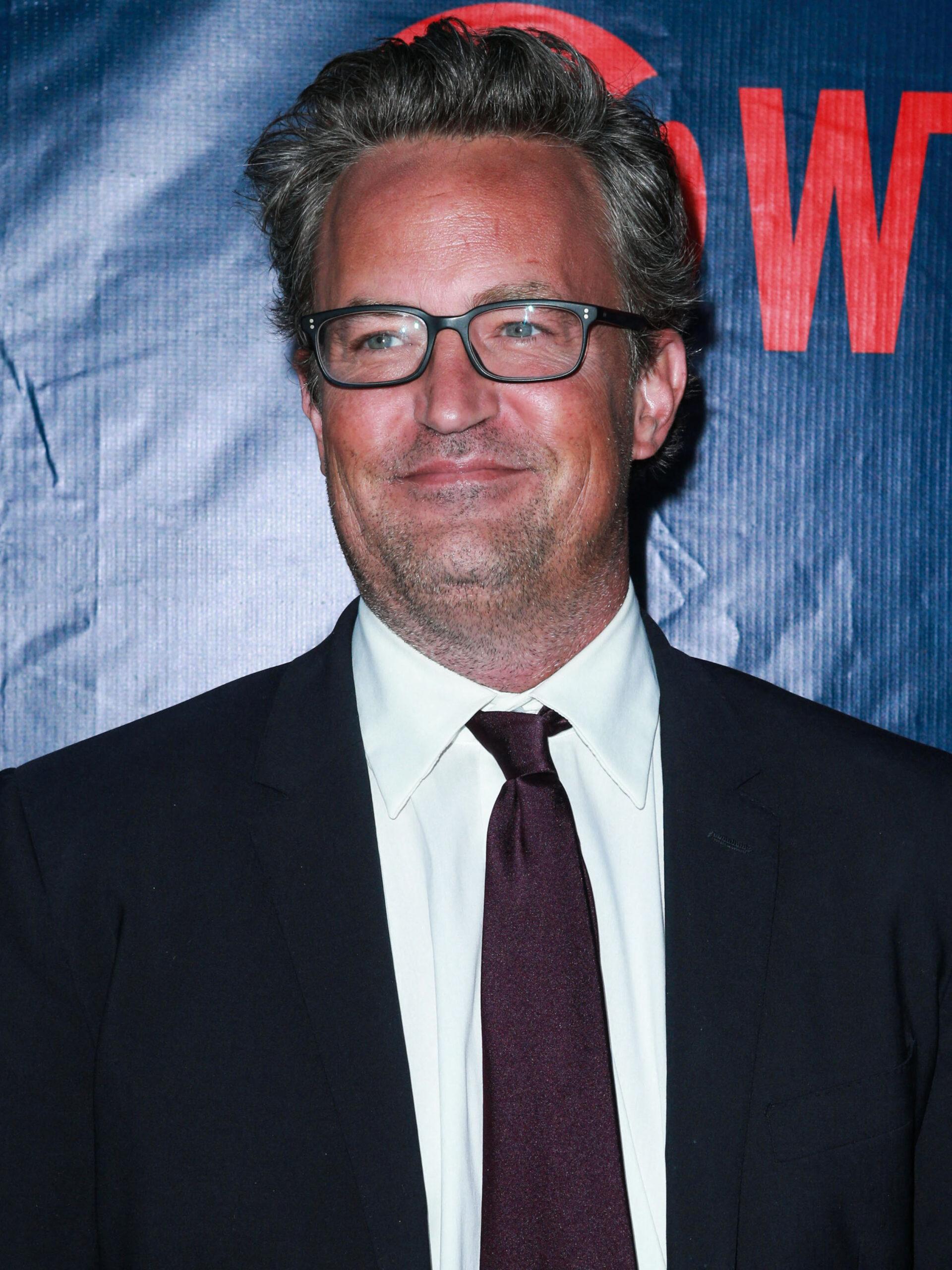 Matthew Perry wearing glasses