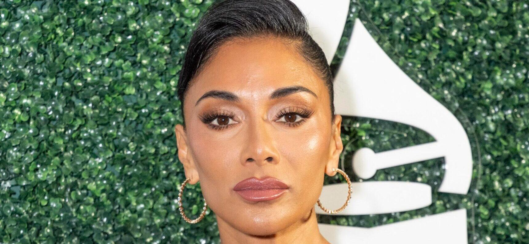 January 27, 2025, New York, New York, USA: Nicole Scherzinger wearing coat and dress and holding purse by Dolce ©. 27 Jan 2025 Pictured: January 27, 2025, New York, New York, USA: Nicole Scherzinger wearing coat and dress and holding purse by Dolce ©. Photo credit: ZUMAPRESS.com / MEGA TheMegaAgency.com sales@mega.global (Mega Agency TagID: MEGA1261211_034.jpg) [Photo via Mega Agency]