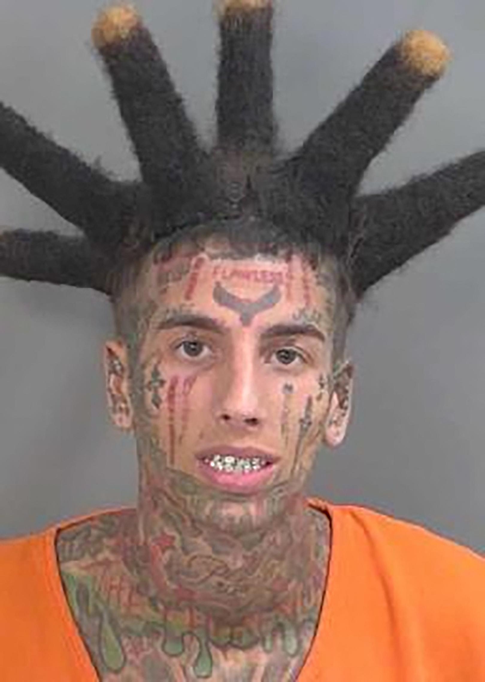 Island Boy Franky Venegas poses for mugshot after being busted for drugs and guns in Florida