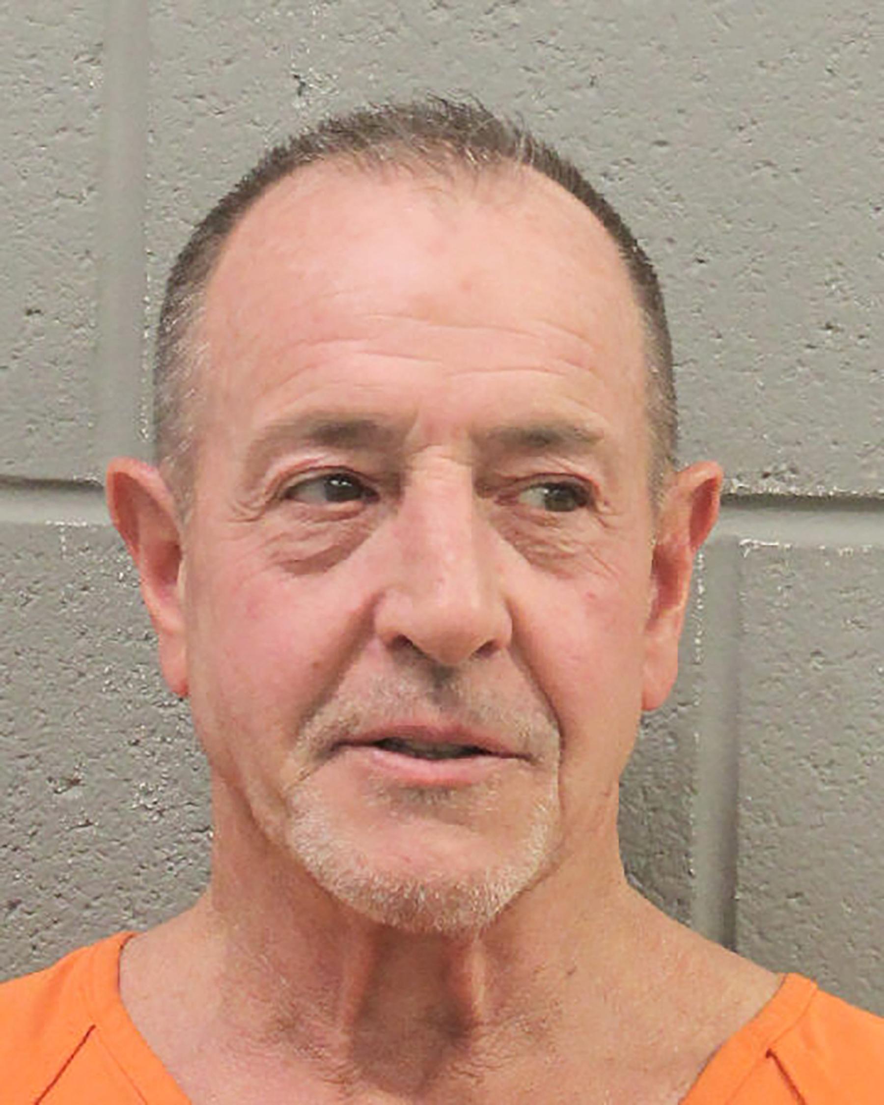 Michael Lohan arrested for allegedly assaulting estranged wife Kate Major - see his latest mugshot.